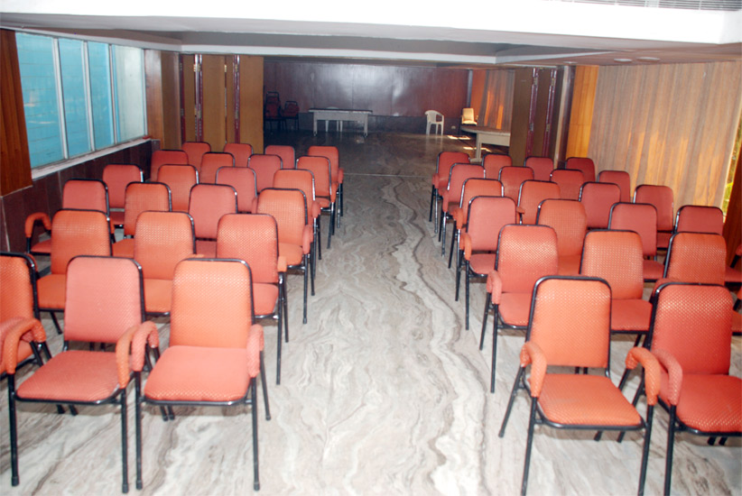 Conference hall with rows of chairs