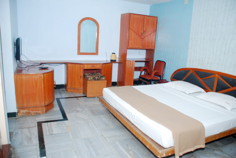 Bedroom with wardrobe and dressing unit